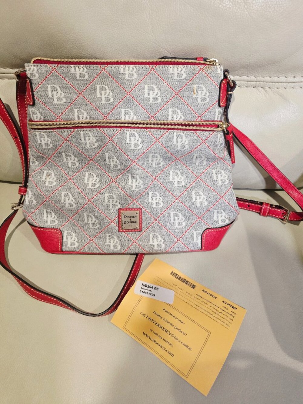 Dooney & Bourke Maxi Quilt Crossbody in the gray (GY / Ash Gray) and red